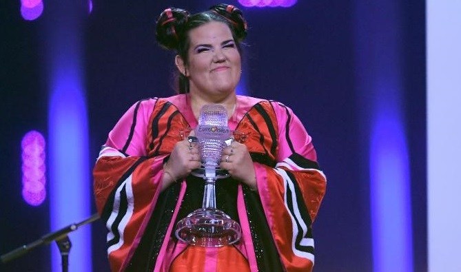 Israel's singer Netta Barzilai aka Netta celebrates with the trophy after winning the final of the 63rd edition of the Eurovision Song Contest 2018 at the Altice Arena in Lisbon, on May 12, 2018. (Photo by Francisco LEONG / AFP) (Photo credit should read FRANCISCO LEONG/AFP/Getty Images)